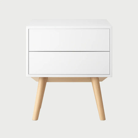 Vista frontal del buró Cuauhtémoc en blanco puro, destacando la limpieza de sus líneas y el contraste con la base de madera clara.