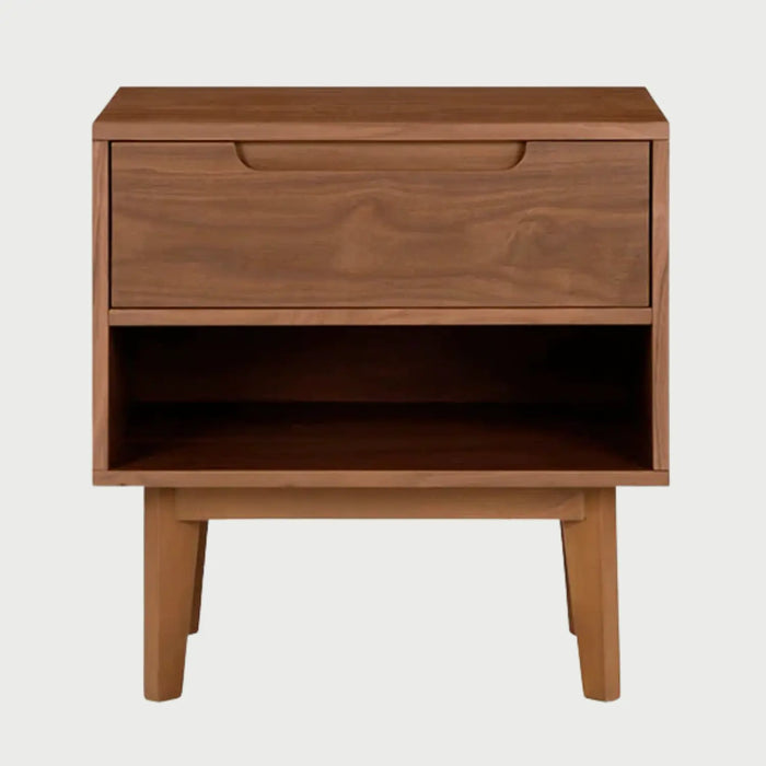 Vista frontal del buró Talitha en acabado café nogal, resaltando la veta natural de la madera y su diseño práctico de almacenamiento dual con cajón y entrepaño.