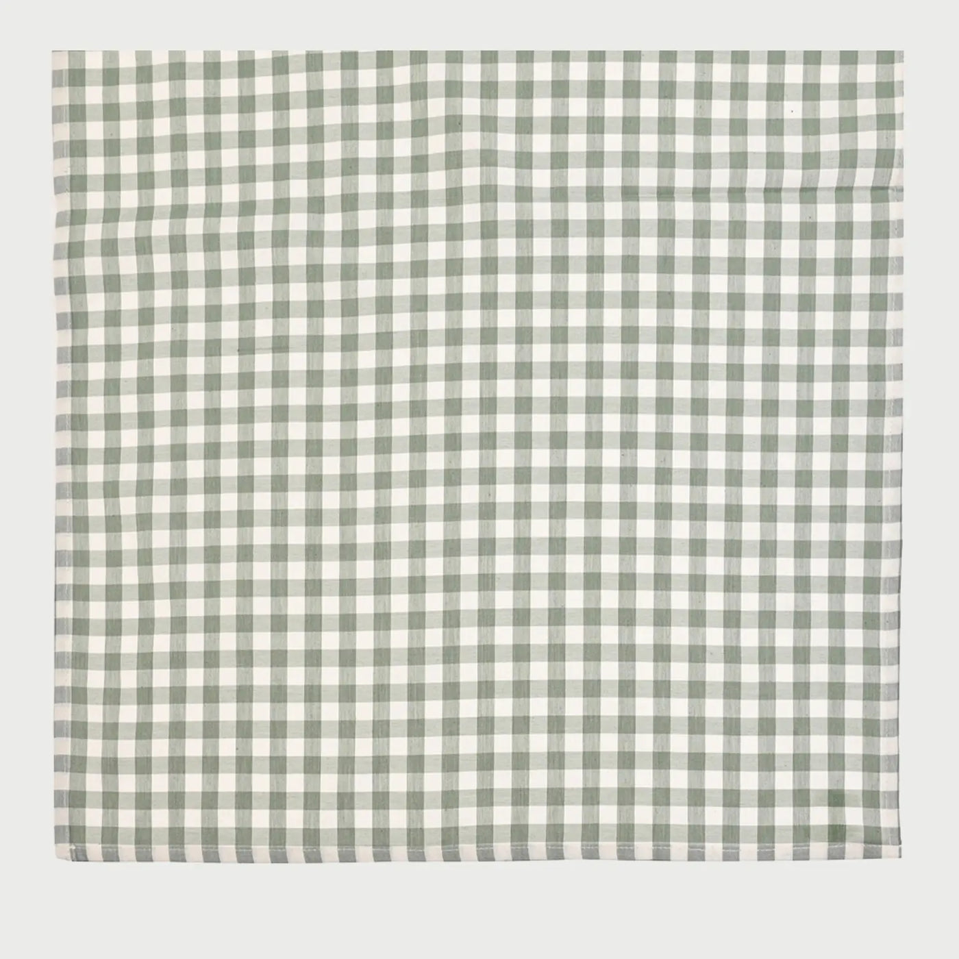 Vista frontal del camino de mesa de 220 cm con patrón de cuadros chicos en color verde y blanco, ideal para montajes de mesa inspirados en la naturaleza.