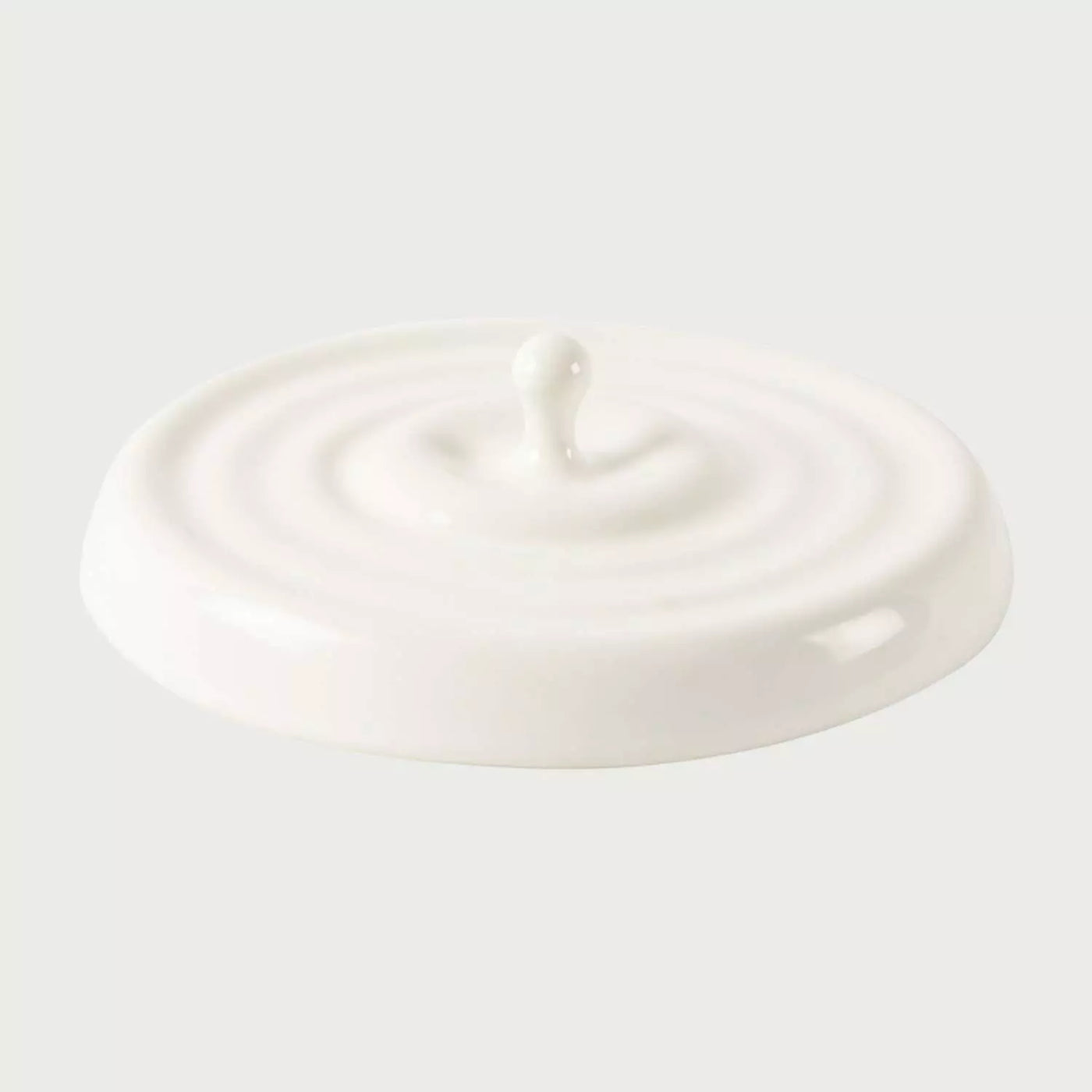 Cenicero Caída de Gota GAIA en cerámica blanca con diseño circular y acabado liso