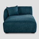 Chaise izquierdo Kant GAIA para sofá modular tapizado en tela azul con diseño de silueta curva vista frontal.