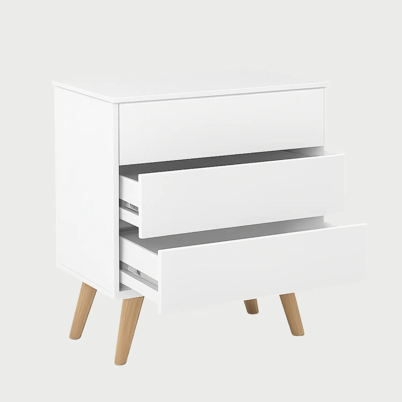 Vista lateral de la cómoda Cuauhtémoc blanca, que muestra la profundidad de su cuerpo rectangular y el diseño estilizado de la base de madera que sobresale sutilmente.