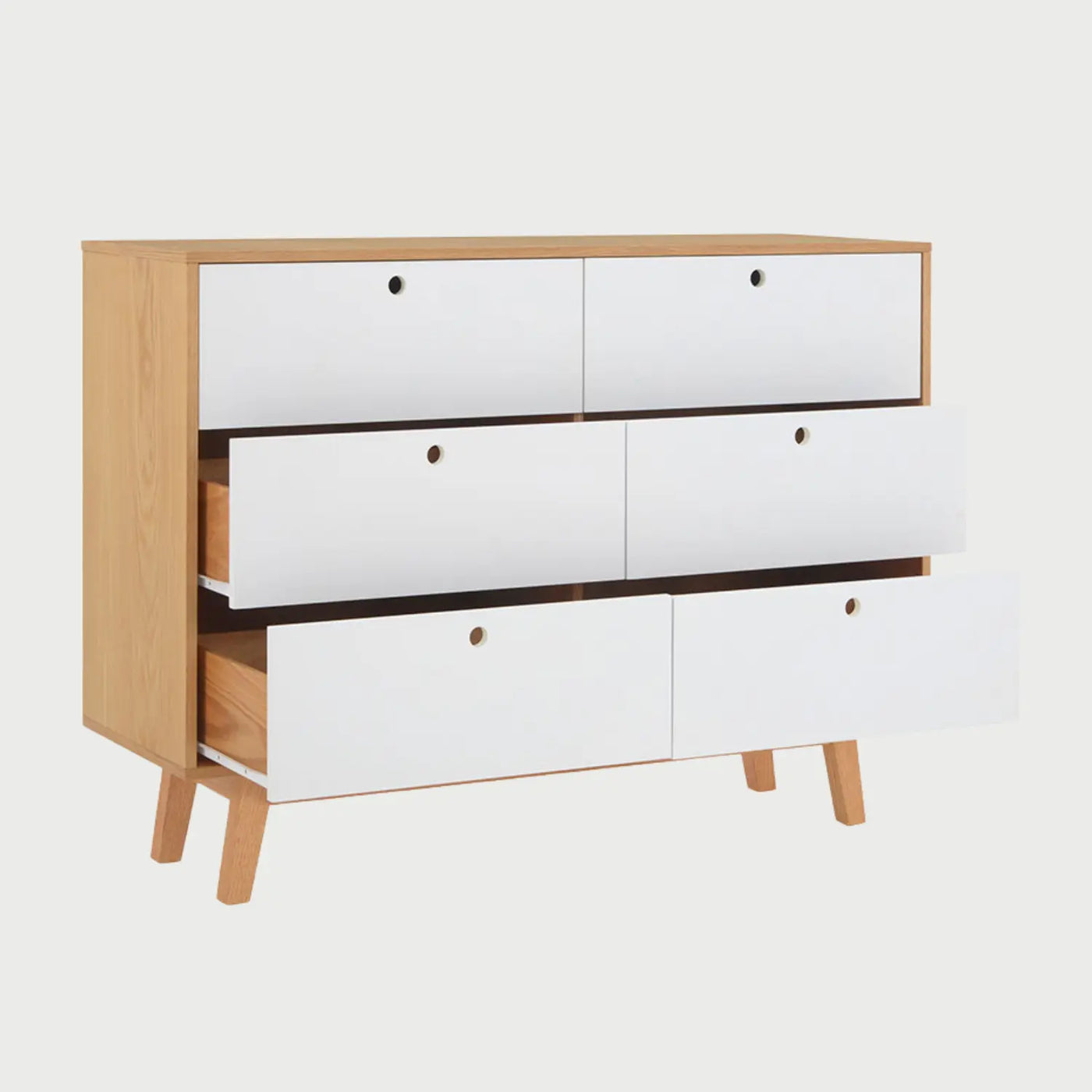 Vista lateral de la cómoda Evo blanca, mostrando el perfil rectangular de la estructura en madera natural y la profundidad de sus compartimentos de almacenamiento.