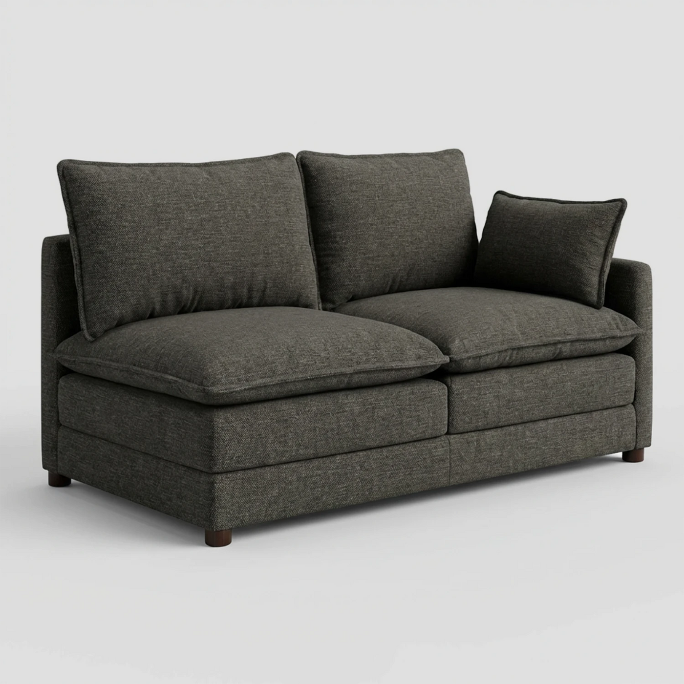 Vista lateral del módulo Andrea con brazo derecho en tela gris mostrando el diseño del descansabrazos.