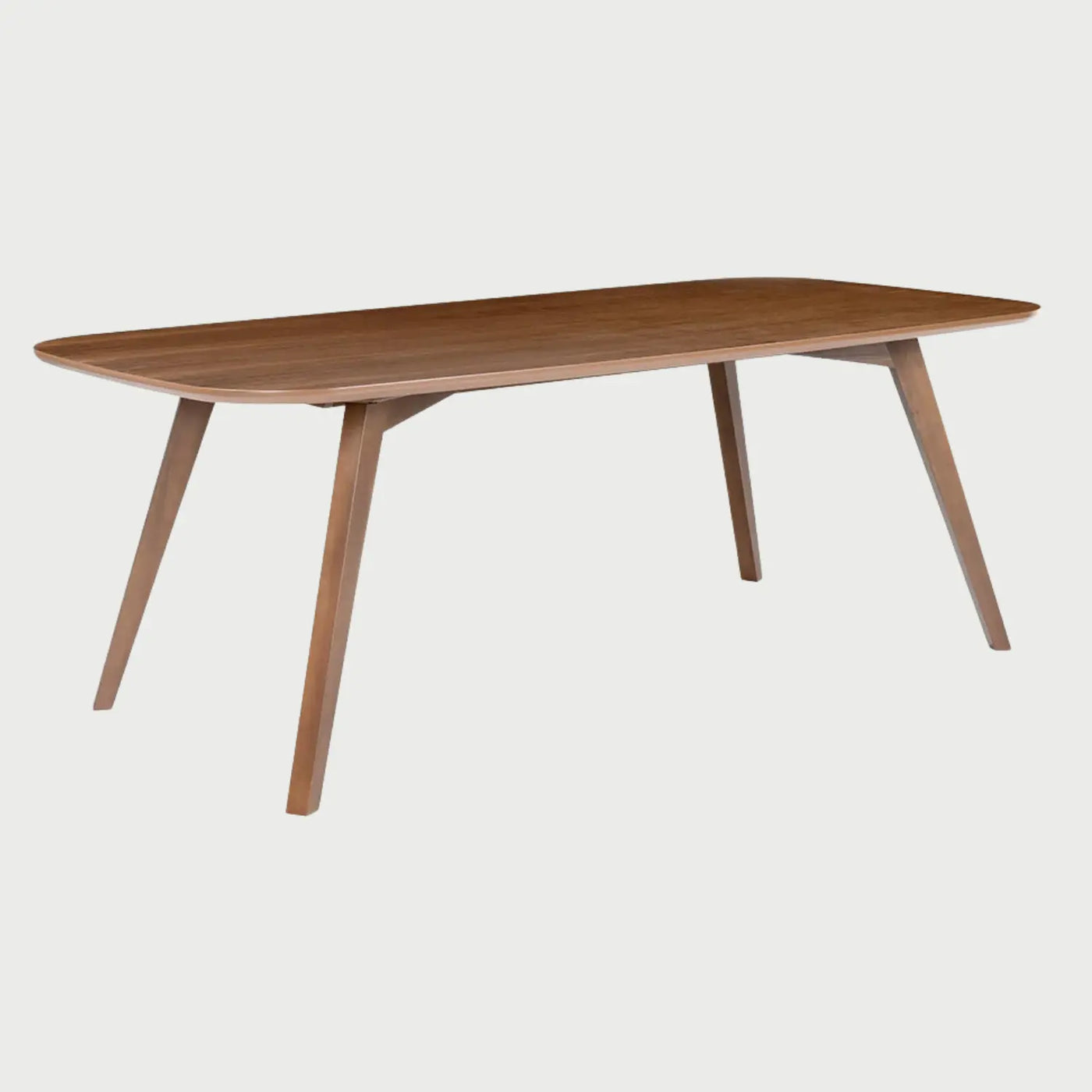 Vista de perfil de la mesa Talitha en tono café; se aprecia el grosor de la cubierta de madera y la inclinación elegante de las patas que maximiza el espacio para las piernas de los comensales.