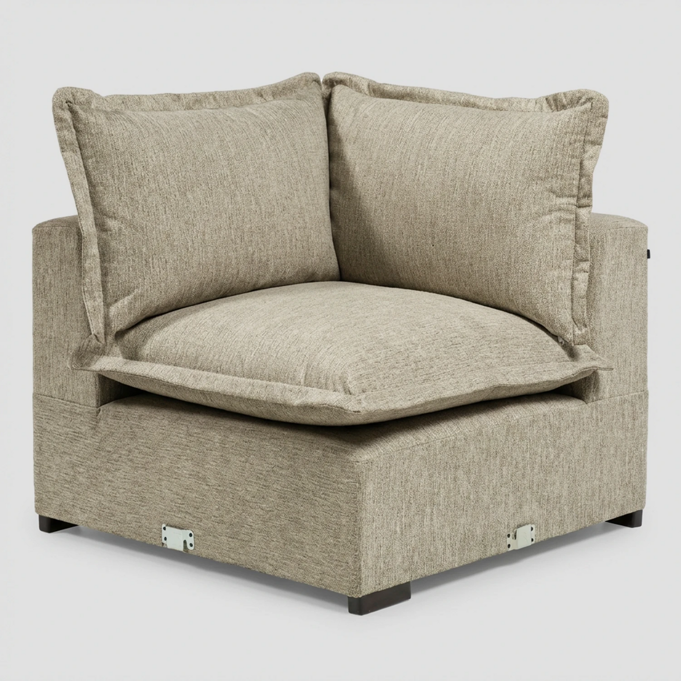 Vista frontal del módulo esquinero Emilia en color gris claro; destaca su diseño de asiento profundo y cojines de respaldo mullidos que forman un ángulo recto.