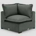 Vista frontal del módulo esquinero Emilia en gris oscuro; resalta el volumen de la cojinería y la estructura sólida en un tono cenizo profundo.