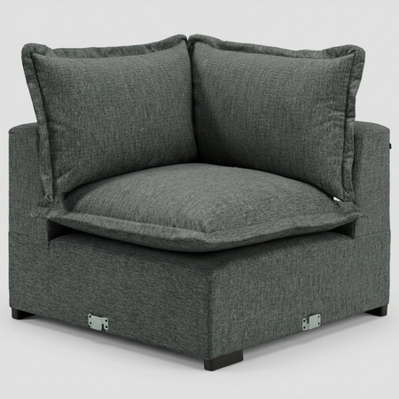 Vista frontal del módulo esquinero Emilia en gris oscuro; resalta el volumen de la cojinería y la estructura sólida en un tono cenizo profundo.