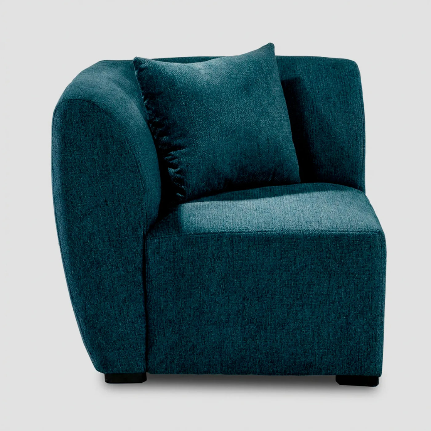 Vista de perfil del módulo esquinero Kant en color azul, resaltando la profundidad de la pieza y su estructura modular de lÃneas limpias.