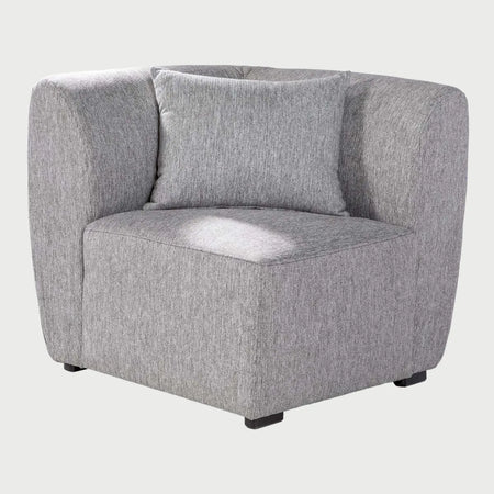 Vista frontal del módulo esquinero Kant GAIA en color gris claro, destacando su silueta minimalista y el tejido de alta resistencia.