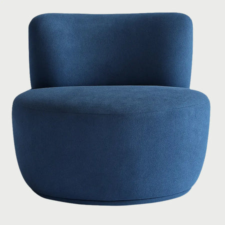Sillón de acento Sam GAIA tapizado en tela azul con diseño orgánico y respaldo curvo vista frontal.