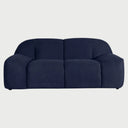 Sofá de dos cuerpos Marcus GAIA tapizado en tela azul obscuro con diseño de silueta redondeada y cojines integrados vista frontal.