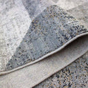 Tapete Temari con superficie texturizada en tonos gris y beige, mostrando un acabado limpio en los bordes.
