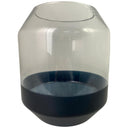 Florero de vidrio Cantil en color negro con base negra y parte superior transparente, de forma redondeada. Ideal para decoración.