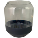 Florero de vidrio Cantil en color negro, con base negra y parte superior transparente, ideal para decorar con flores.
