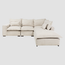 Sofá modular en color marfil con chaise lounge a la derecha, diseño contemporáneo y cojines cómodos. Perfecto para tu sala.