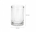 Tequileros de vidrio transparente con diseño estriado y base texturizada, perfectos para disfrutar de tu tequila favorito.