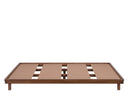 Base de cama rectangular en acabado nogal, con estructura de listones y un perfil bajo, ideal para recámaras.