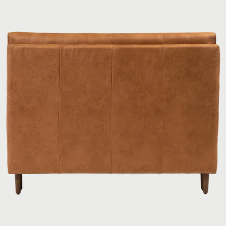 Vista posterior de la cama Landero; permite apreciar el acabado del reverso de la cabecera y la solidez de la unión entre el respaldo y los largueros laterales tapizados.