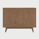 Vista posterior de la cómoda Evo de 6 cajones en acabado nogal, con un panel de respaldo sólido que asegura la estabilidad estructural del mueble de gran formato.