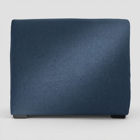 Vista posterior del módulo central Kant azul; el tapizado continuo permite su lucimiento en espacios abiertos, facilitando la creación de sofás modulares de gran tamaño.