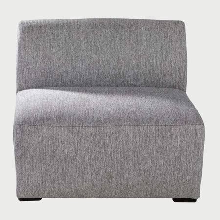 Vista frontal del módulo central Kant en color gris claro; destaca su estética contemporánea y neutra, ideal para combinar con diferentes estilos de decoración y otros módulos de la serie.