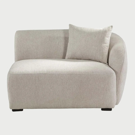 Vista frontal del módulo lateral derecho Kant GAIA en color blanco, destacando la luminosidad de su diseño curvo y su estética minimalista.