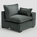 Vista lateral del módulo Emilia gris oscuro, donde se aprecia la altura del brazo y la base sólida que apoya el diseño modular.