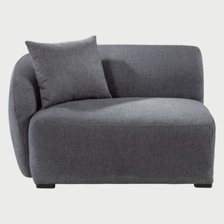 Módulo lateral izquierdo Kant GAIA en tela gris obscuro resaltando el respaldo curvo envolvente.