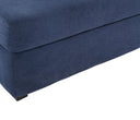 Sofá modular azul Amil con superficie acolchada y base estructurada, ideal para un espacio moderno y acogedor.