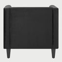 Vista posterior del sillón Moncayo GAIA en terciopelo negro, resaltando el tapizado liso y continuo del respaldo que mantiene una estética minimalista y lujosa desde cualquier ángulo.