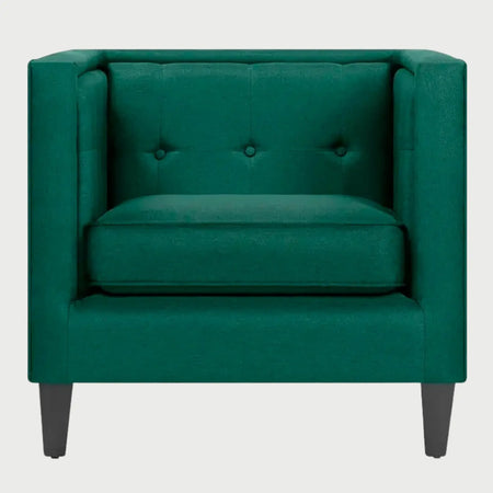 Sillón Moncayo GAIA en terciopelo verde esmeralda con diseño elegante y patas de madera.