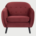 Sillón de diseño vintage San Blas GAIA en color vino resaltando el detalle de botones en el respaldo.