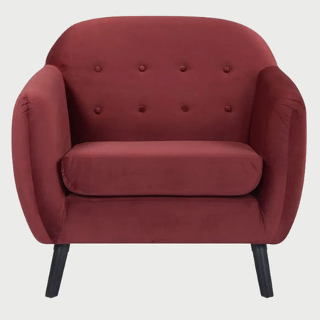 Sillón de diseño vintage San Blas GAIA en color vino resaltando el detalle de botones en el respaldo.
