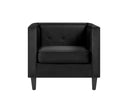 Sillón Moncayo tapizado en terciopelo negro, con diseño moderno y respaldo acolchado, ideal para cualquier sala.