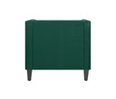 Sillón Moncayo en terciopelo verde esmeralda con un diseño moderno, respaldo cuadrado y patas rectas. Perfecto para tu sala.