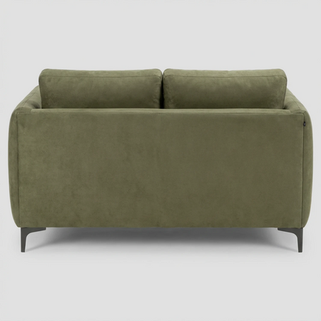 Vista posterior del sofá Marina color verde, mostrando un acabado tapizado impecable y uniforme, ideal para colocarlo como divisor de ambientes.