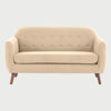 Sofá moderno San Blas GAIA de 2 cuerpos en tela beige con patas de madera oscura color nogal y diseño de inspiración vintage.