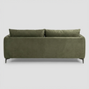 Vista posterior del sofá Marina de tres cuerpos en color verde, mostrando un tapizado impecable en todo el respaldo que permite su uso como divisor de estancias.