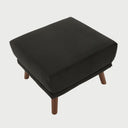 Vista posterior del taburete San Blas en terciopelo negro, exhibiendo un acabado tapizado uniforme y elegante que resalta sobre su base de madera oscura.