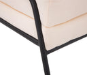 Taburete Tuxama con un diseño moderno, patas de madera negras y un cojín suave y grueso que aporta confort y estilo.